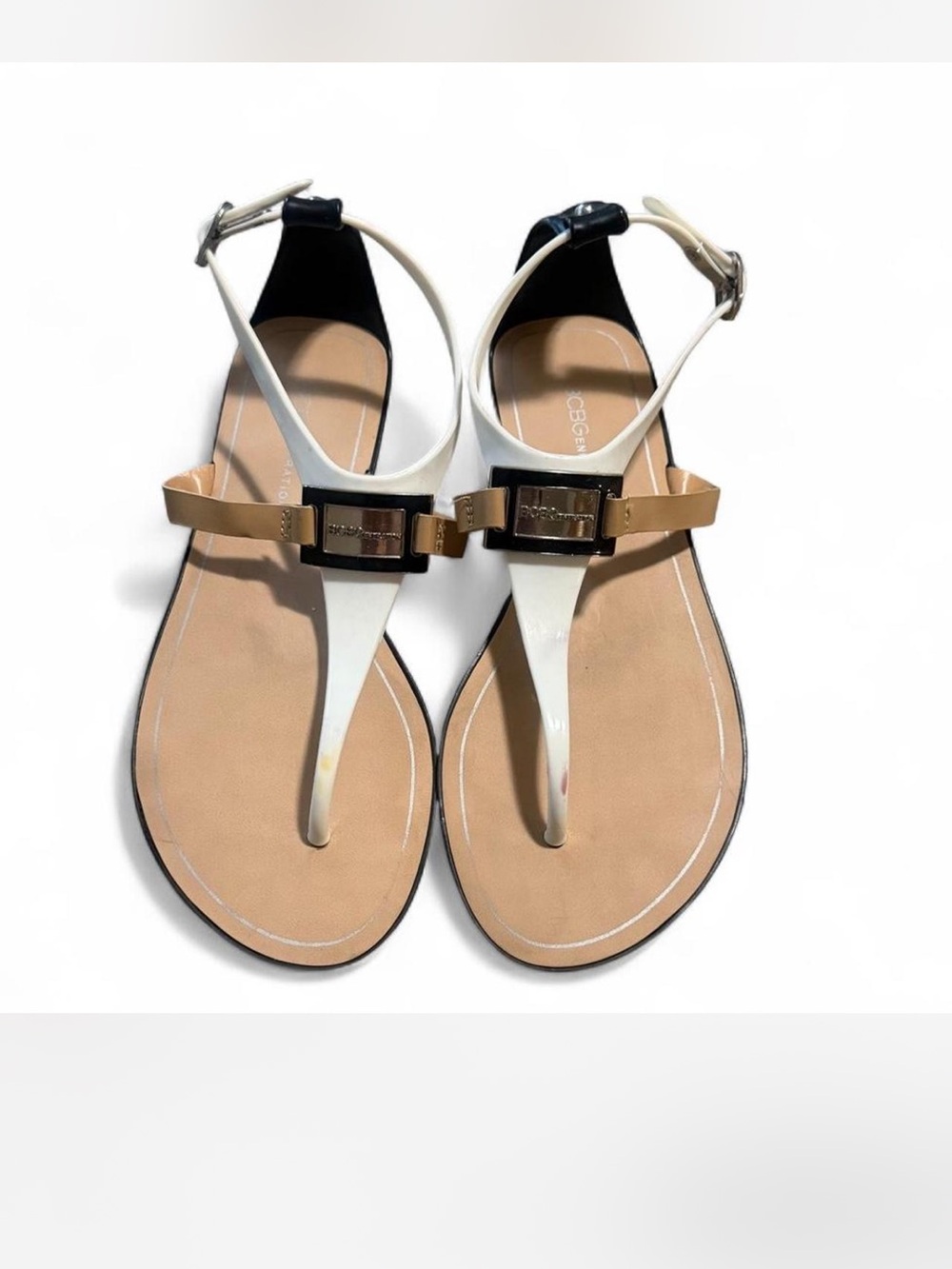 BCBGeneration White and Tan T-Strap Sandals with Gold Accent